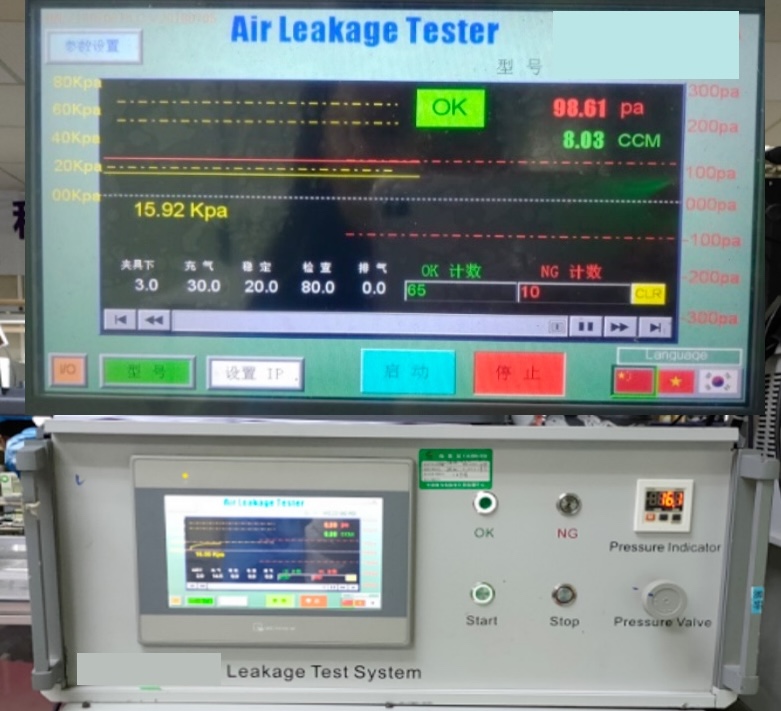 IP67 leak test setup with heat sink clamped in test fixture