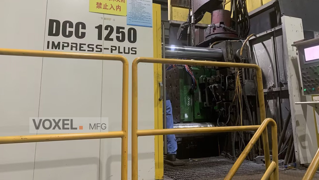 DCC 1250-ton die-casting machine used for manufacturing large-scale, precision telecom and RF cavity enclosures at Voxel Manufacturing